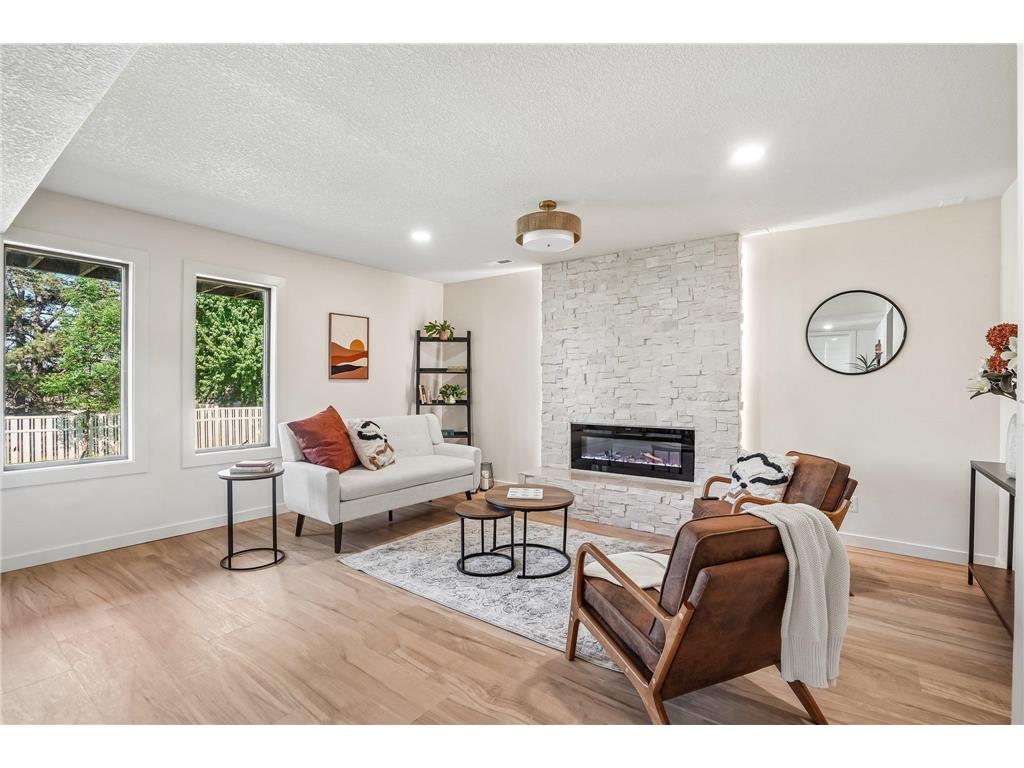 Living room with a new stone fireplace